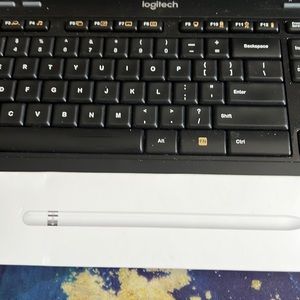 First Gen apple pencil in box with additional point and instructions